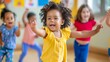 © HanThar Fusion - Children dancing happily together at nursery school