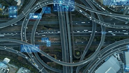 Wall Mural - Composited image of drone aerial view of modern highway with cars running and digital technology concept.