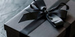 © Jirawatfoto - Elegant Black Gift Box with Chic Black Ribbons for Modern Gifting Presentation