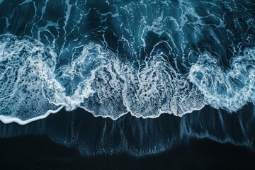 Wall Mural - ocean waves crashing on black sand beach