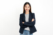 © sitthiphong - Young beautiful Asian businesswoman standing with arms crossed isolated in white background.