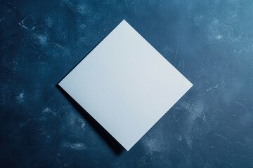 Aufkleber - A single square piece of paper on a solid blue background, ready for writing or drawing