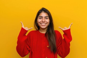 Poster - A woman wearing a red sweater makes a hand gesture, possibly to communicate or express herself