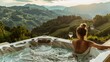 © Suleyman - A young woman soaks in a hot tub with a glass of wine, taking in the stunning view of green mountains as she enjoys her vacation.