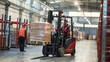 © pakbung - Warehouse worker driving a forklift in a warehouse