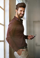 Leinwandbilder - Creative, man and portrait with smartphone in office for client feedback, project updates and timeline for task. Multimedia designer, mobile phone and online for job approval and objectives.