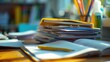 © buraratn - A close-up of a stack of homework assignments on a teacher desk.
