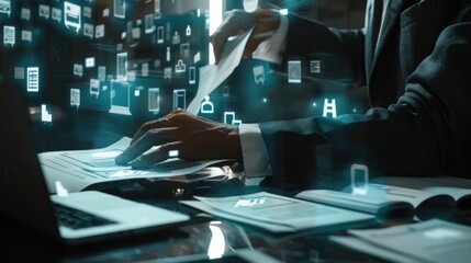 Businessman in front of laptop using virtual screen