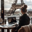 © SCTProjects - Woman working with Eiffel Tower view