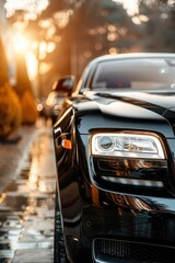 Sticker - A shiny white car with a chrome wheel. The car is parked on a street with a reflection of the car in the water