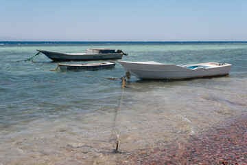 Wall Mural - Boats in the sea. View from Dahab beach, Egypt.