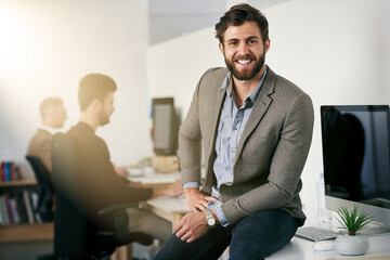 Poster - Creative, man and portrait or relax on desk in office for work or career in project management by agency. Lead graphic designer, studio supervisor and happy in workplace, pride and proud for job