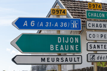 Wall Mural - Driving in summer on  road,  signs direction to Dijon, Beaune and other French cities, different types or roads in France, transportation and traffic