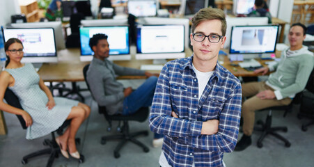 Poster - Man, confident and creative in workplace for portrait, serious and web design career in start up business with skills. Professional, crossed arms and proud employee in office, ux designer and company
