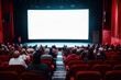 © Igor - Cinema blank screen and people in red chairs in the cinema hall. Blurred People silhouettes watching movie