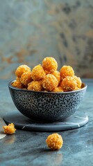 Wall Mural - Bowl with corn balls on two tone background 