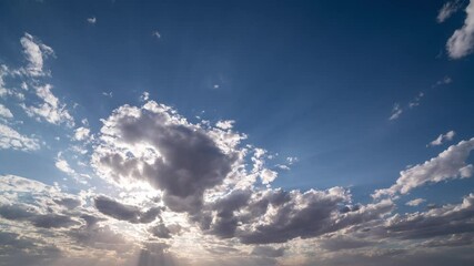 Wall Mural - blue sky white clouds. puffy fluffy white clouds. cumulus cloud cloudscape timelapse. summer blue sk