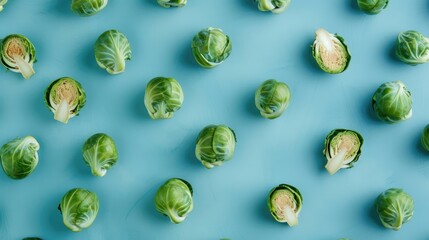 Poster - green brussel sprouts flat lay on bright background healthy food concept with art design card text s