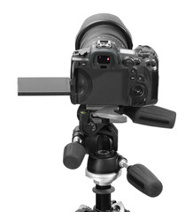 Wall Mural - Modern camera with tripod isolated on white. Photographer's equipment