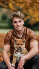 Canvas Print - A man in brown shirt and a dog.