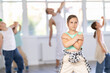 © JackF - Positive girls and boys training hip hop in dance studio, dance classes for kids