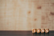 © hogehoge511 - There is wood cube with the word IFRS. It is an abbreviation for International Financial Reporting Standard as eye-catching image.