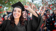 © Andy Dean - Young Female Graduate Celebrating Her Graduation with Her Fellow Classmates Outdoors.