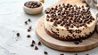 © Tati - Decadent chocolate chip cheesecake on wooden board