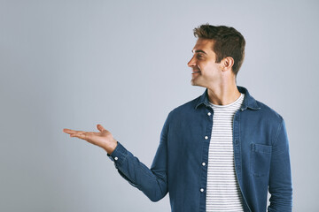 Poster - Option, showing and man with announcement, opportunity and model on grey studio background. Timeline, person and guy with hand gesture, mockup space and promotion with discount deal and coming soon