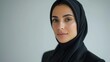 © Zeynep - A Close up of a Woman Wearing a Black Headscarf and a Black Shirt - Generative AI