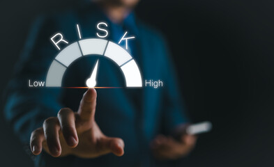 Aufkleber - Risk management concept. Businessman touching risk level indicator virtual rating low to high for financial banking analysis and business. money risk assessment, Reducing project risk, invest strategy