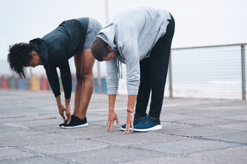 Canvas Print - Stretching, couple and outdoor for exercise or fitness, wellness and training for flexibility. Man, woman and mobility for health, support and warm up for cardio with personal trainer in Los Angeles