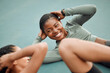 © KayJoint/peopleimages.com - Smile, outdoor and people with fitness for sit ups, workout or exercise for power, health or strong core. Teamwork, women or happy athletes on court for balance, body training and abs together in USA