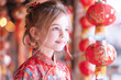 © Aris - Caucasian girl smile wearing red cheongsam at lunar chinese new year festival
