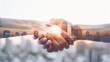 © justholla - Business team holding hands, cityscape double exposure, unity concept, warm sunlight, modern style