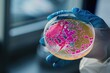 © Akarat Phasura - Concept of Listeria Bacteria , A hand wearing medical glove is holding a dish containing listeria bacteria, Generative AI