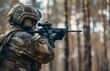 © Sourav Mittal - A Russian soldier in a camouflage uniform with a helmet and tactical vest is holding an assault rifle and aiming down the sights in an over the shoulder close up view of the weapon. The full body shot