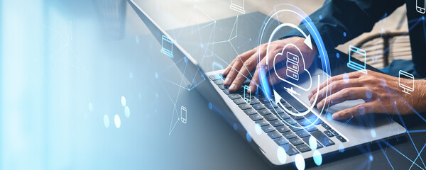 Poster - Man typing on laptop, cloud service hologram and devices connection. Copy space
