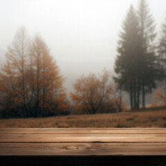 Poster - Empty wooden tabletop with a blurred backdrop of a misty autumn forest, perfect for product placement