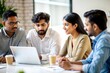 © N7 - 'Indian Business Team Collaborating on Creative Ideas' – A diverse group brainstorming and sharing ideas.