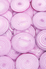 Wall Mural - Onion slices as a background. Top view.