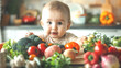 © Anuphong - Closeup of a beautiful newborn toddler baby sitting at a kitchen table full of raw vegetables on a plate. Healthy, fresh and organic nutrition for an infant girl indoors