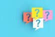 © Cagkan - Question marks appearing in speech bubbles on blue background