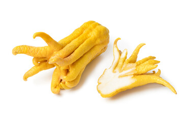 Wall Mural - Whole and halved  ripe Buddha's fingers, citrus medica, isolated on white background close up