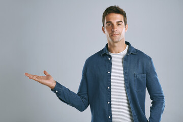 Aufkleber - Portrait, showing and man with review, opportunity and model on grey studio background. Face, person and guy with hand gesture, mockup space and promotion with discount deal, welcome and coming soon