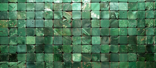 Poster - A mosaic of green tiles creating a textured pattern with copy space image