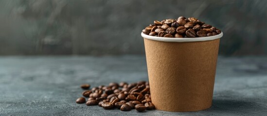 Aufkleber - A paper cup filled with coffee beans against a grey backdrop with ample copy space image