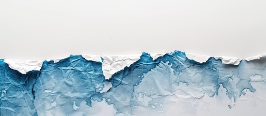 Poster - White and blue rice paper with torn edges on white background with copy space image