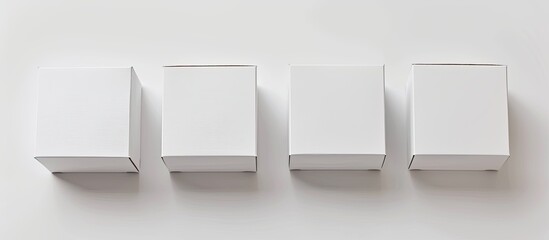 Aufkleber - Four white packaging boxes arranged on a white background emphasizing the concept of shipping delivery and transportation with copy space image