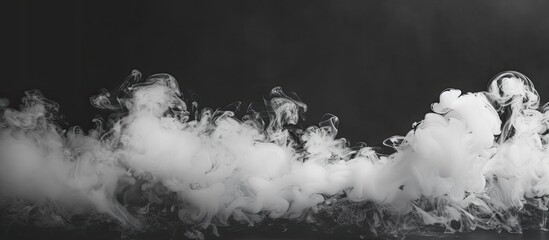 Sticker - White smoke on a black background, providing ample copy space image.